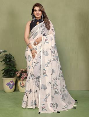 Soft linen cotton printed saree
with cotton tassles on pallu 
matching blouse 1