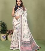 Soft linen cotton printed saree
with cotton tassles on pallu 
matching blouse