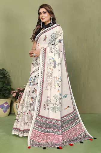 Soft linen cotton printed saree
with cotton tassles on pallu 
matching blouse