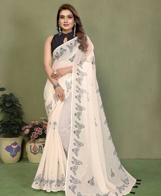 Soft linen cotton printed saree
with cotton tassles on pallu 
matching blouse 1