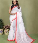 Soft linen cotton printed saree
with cotton tassles on pallu 
matching blouse
