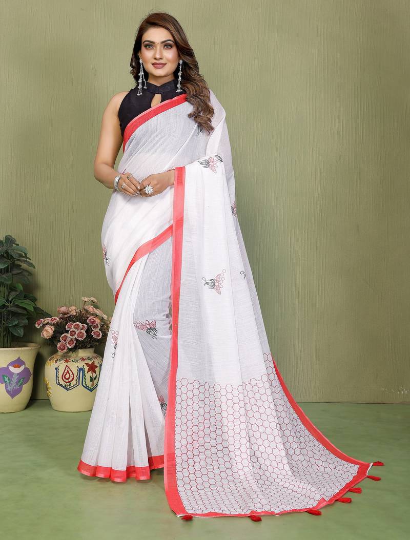 Soft linen cotton printed saree
with cotton tassles on pallu 
matching blouse