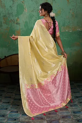 Pastel yellow & pink zari woven linen silk blend saree with floral motifs