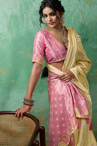 Pastel yellow & pink zari woven linen silk blend saree with floral motifs