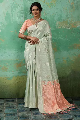 Mint green & peach zari woven linen silk bend saree with floral motifs