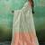 Mint green & peach zari woven linen silk bend saree with floral motifs