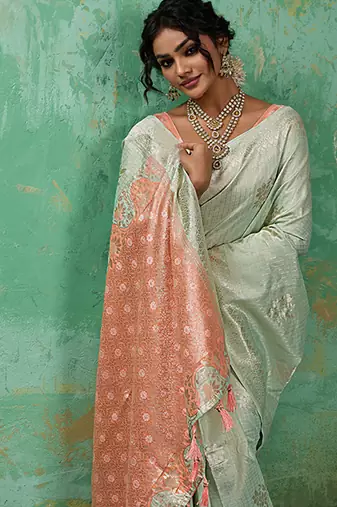 Mint green & peach zari woven linen silk bend saree with floral motifs