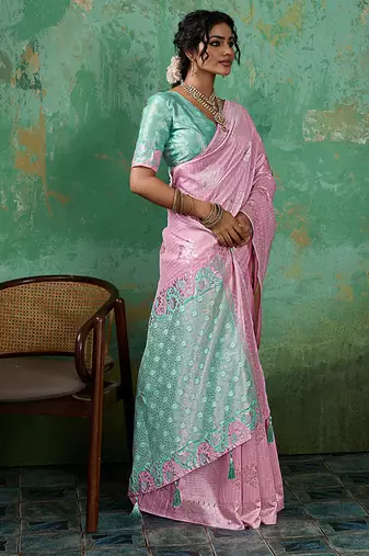 Pink & mint green zari woven linen silk bend saree with floral motifs