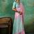 Pink & mint green zari woven linen silk bend saree with floral motifs