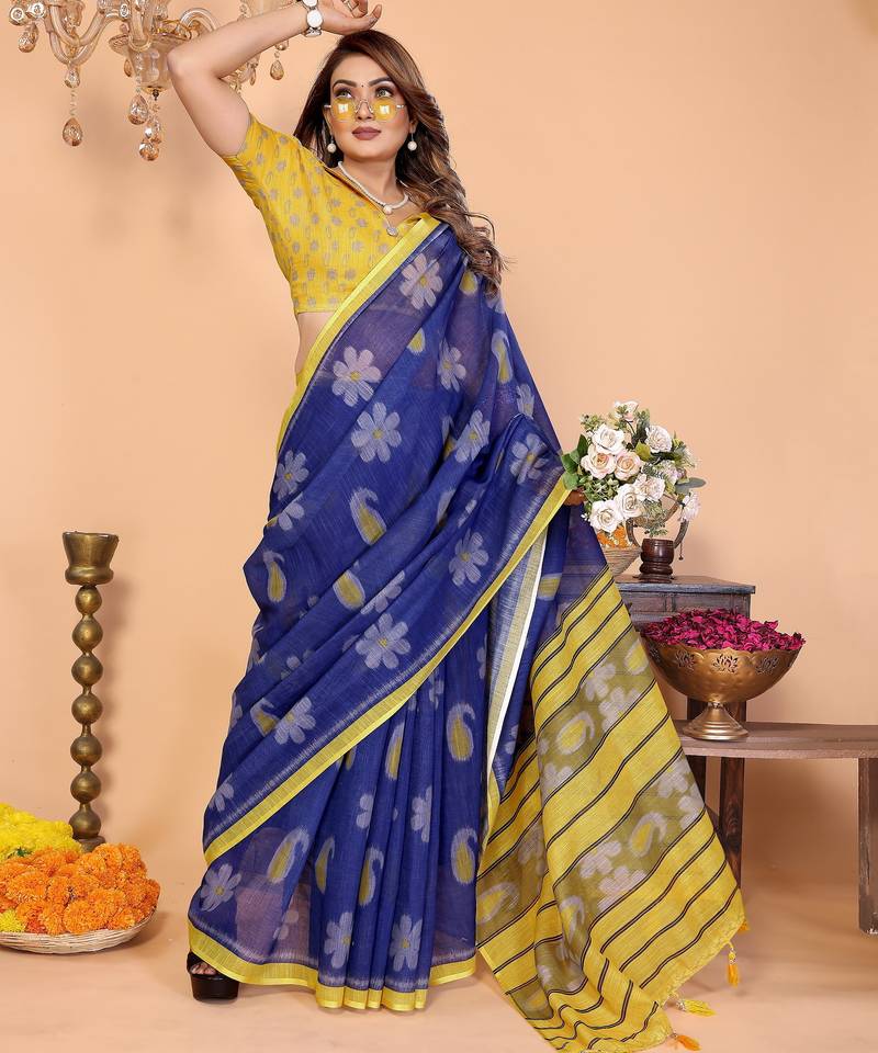 Soft linen cotton printed saree
with cotton tassles on pallu 
matching blouse