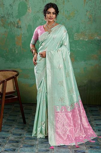 Mint green & pink zari woven linen silk bend saree with floral motifs