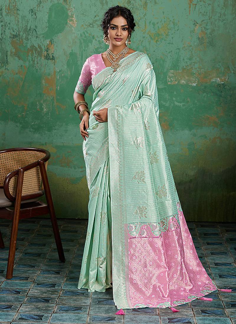 Mint green & pink zari woven linen silk bend saree with floral motifs