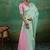 Mint green & pink zari woven linen silk bend saree with floral motifs
