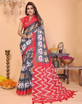 Soft linen cotton printed saree
with cotton tassles on pallu 
matching blouse 1