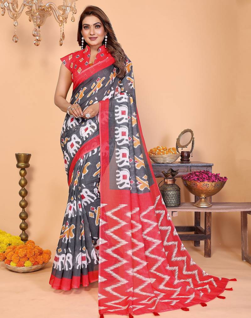 Soft linen cotton printed saree
with cotton tassles on pallu 
matching blouse