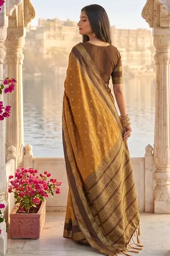 Rust & brown zari woven banarasi silk blend saree
