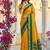 Mustard & green zari woven banarasi silk blend saree