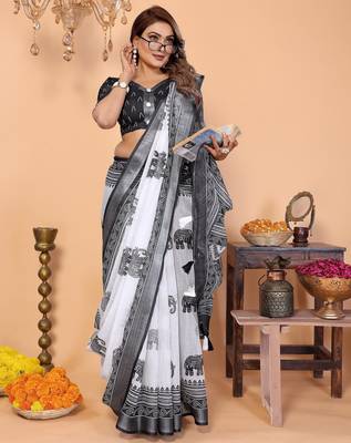 Soft linen cotton printed saree
with cotton tassles on pallu 
matching blouse 1