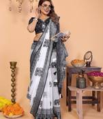 Soft linen cotton printed saree
with cotton tassles on pallu 
matching blouse