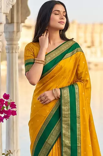 Mustard & green zari woven banarasi silk blend saree