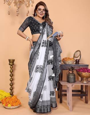 Soft linen cotton printed saree
with cotton tassles on pallu 
matching blouse 2
