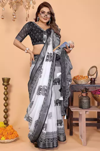 Soft linen cotton printed saree
with cotton tassles on pallu 
matching blouse