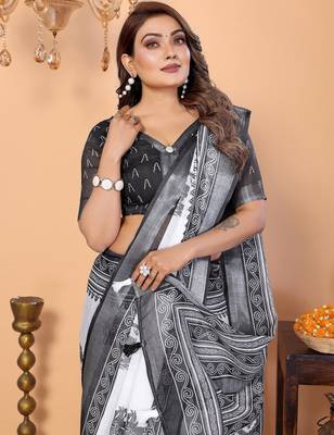Soft linen cotton printed saree
with cotton tassles on pallu 
matching blouse 3
