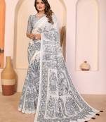 Soft linen cotton printed saree
with cotton tassles on pallu 
matching blouse