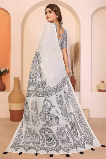 Soft linen cotton printed saree
with cotton tassles on pallu 
matching blouse