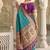Aqua blue banarasi silk blend saree with paithani floral pallu