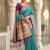 Aqua blue banarasi silk blend saree with paithani floral pallu