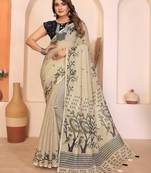 Soft linen cotton printed saree
with cotton tassles on pallu 
matching blouse