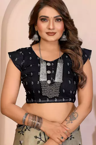 Soft linen cotton printed saree
with cotton tassles on pallu 
matching blouse