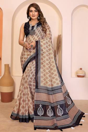Soft linen cotton printed saree
with cotton tassles on pallu 
matching blouse