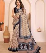 Soft linen cotton printed saree
with cotton tassles on pallu 
matching blouse