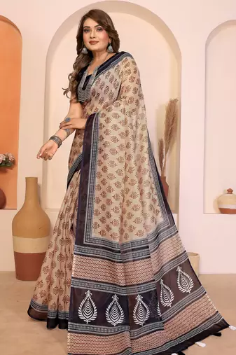 Soft linen cotton printed saree
with cotton tassles on pallu 
matching blouse