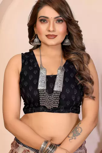Soft linen cotton printed saree
with cotton tassles on pallu 
matching blouse