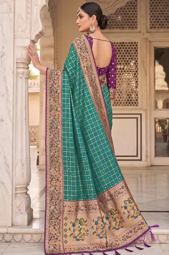 Teal banarasi silk blend saree with paithani floral pallu