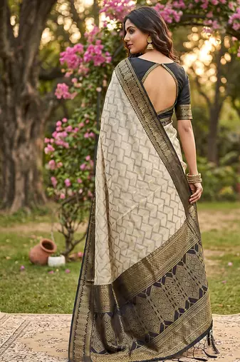 Beige cotton-silk blend saree with contrast black zari border