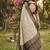 Beige cotton-silk blend saree with contrast black zari border