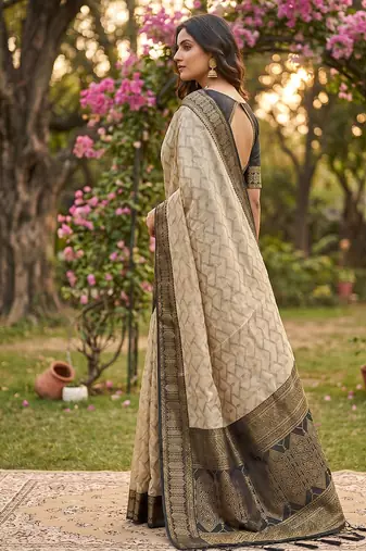 Beige cotton-silk blend saree with contrast black zari border