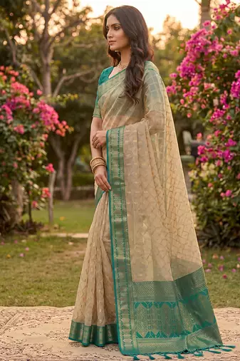 Beige cotton-silk blend saree with contrast rama green zari border