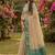 Beige cotton-silk blend saree with contrast rama green zari border