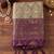 Beige cotton-silk blend saree with contrast purple zari border
