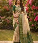 Beige cotton-silk blend saree with contrast dark green zari border