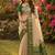 Beige cotton-silk blend saree with contrast dark green zari border