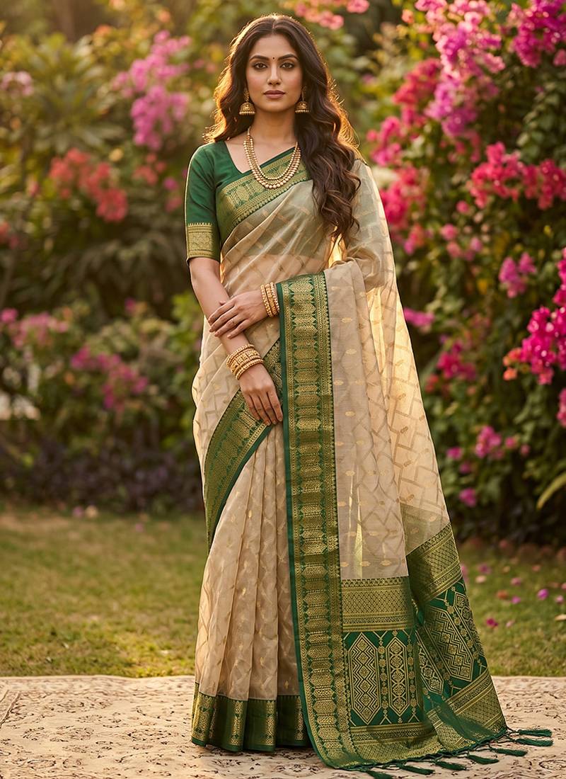 Beige cotton-silk blend saree with contrast dark green zari border