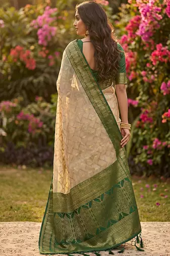 Beige cotton-silk blend saree with contrast dark green zari border