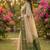 Beige cotton-silk blend saree with contrast dark green zari border