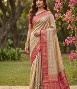 Beige cotton-silk blend saree with contrast rani pink zari border
